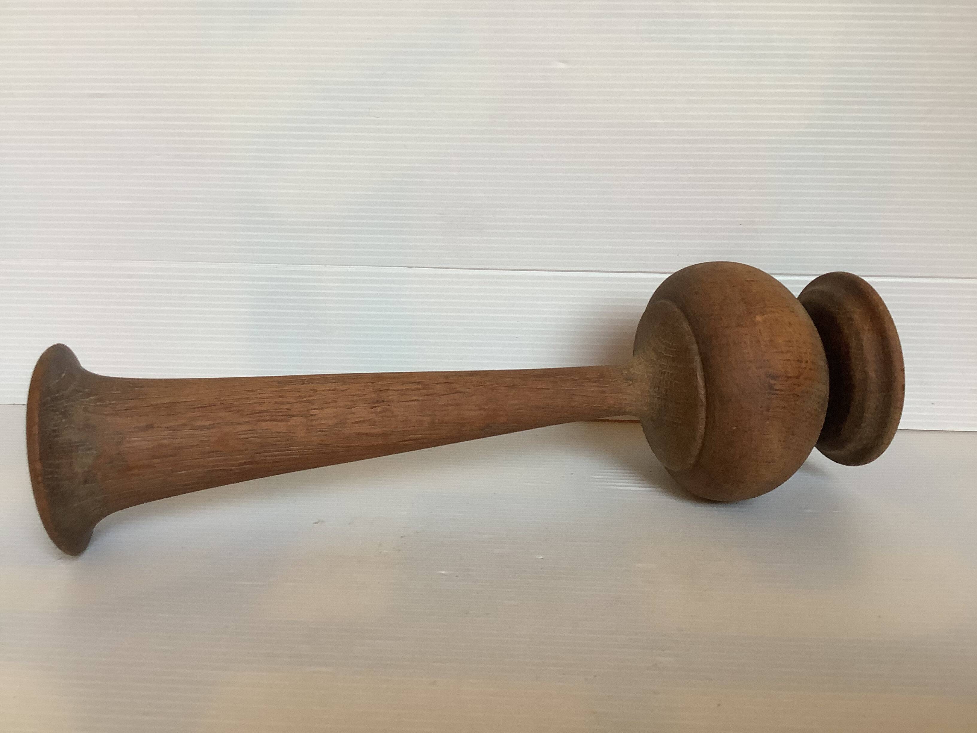 Old trumpet-shaped wooden vase