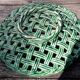 Fruit cut in green braided bubble