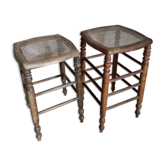 Two wooden stools and cannage