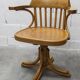 Scandinavian 1960s curved wood swivel office chair