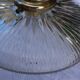 Holophane glass and brass wall light