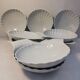 10 small dishes / ramekins / shell-shaped cups. French porcelain