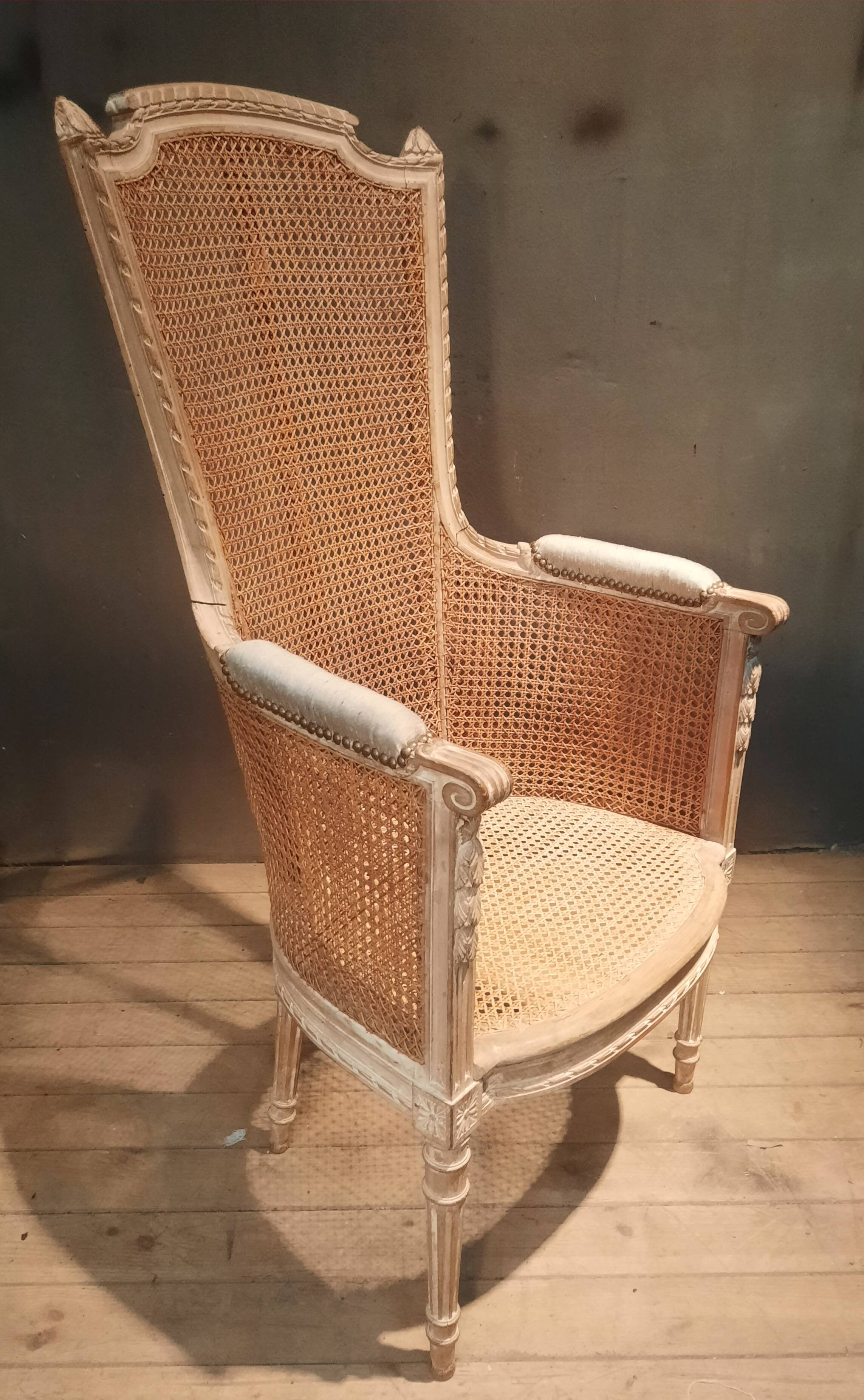 Louis XVI high-backed caned armchair