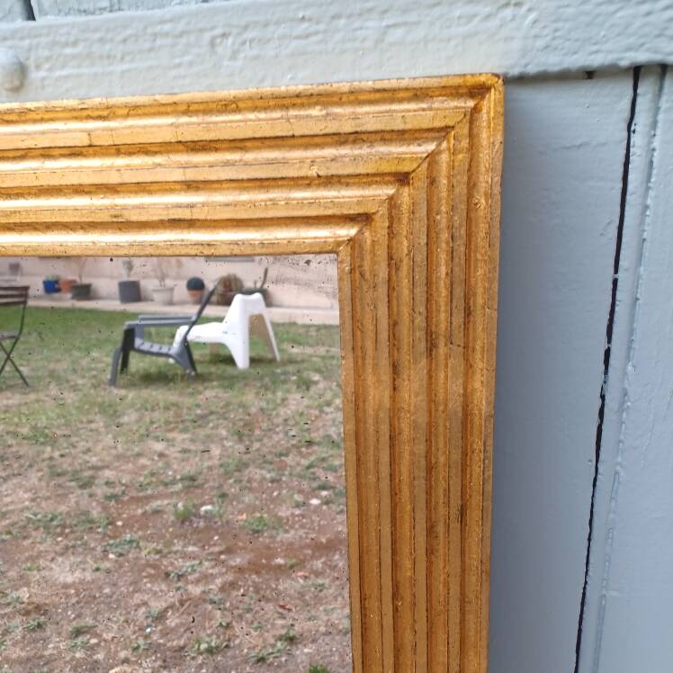 Grand golden mirror from the revolutionary period 110 cm x 74 cm