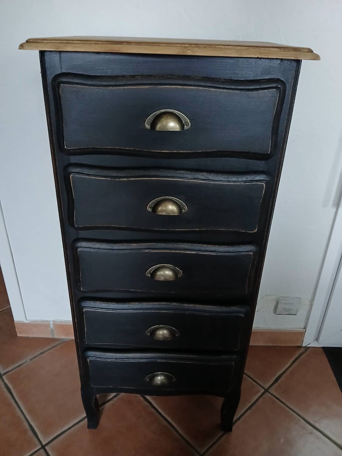 Black painted wooden chest of drawers