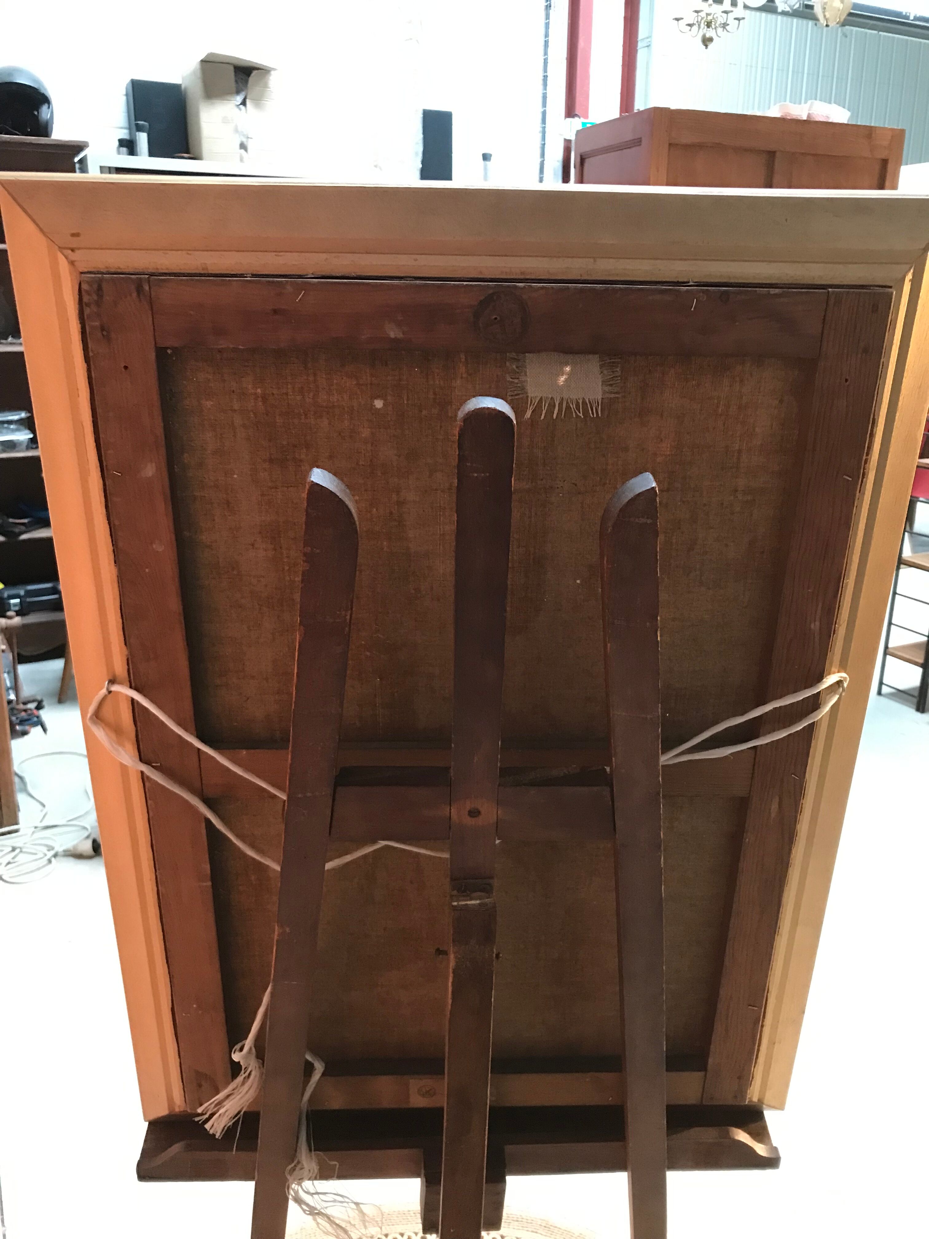 Framed painting depicting a forest