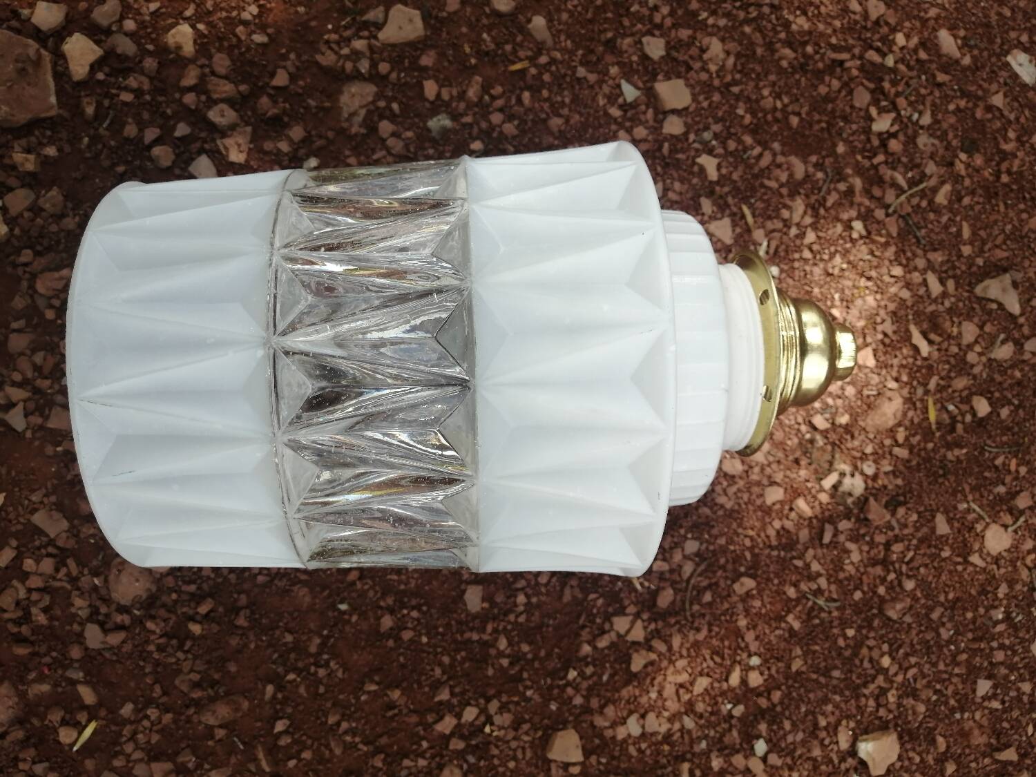 Vintage globe pendant light in molded glass.