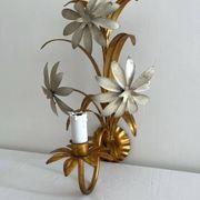 Vintage Hollywood Regency gold metal leaf wall sconce.