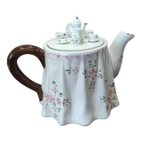Teapot with pink floral pattern