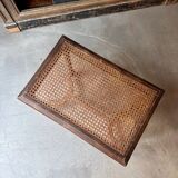 Stool, small wooden piano bench with carved details and caning.