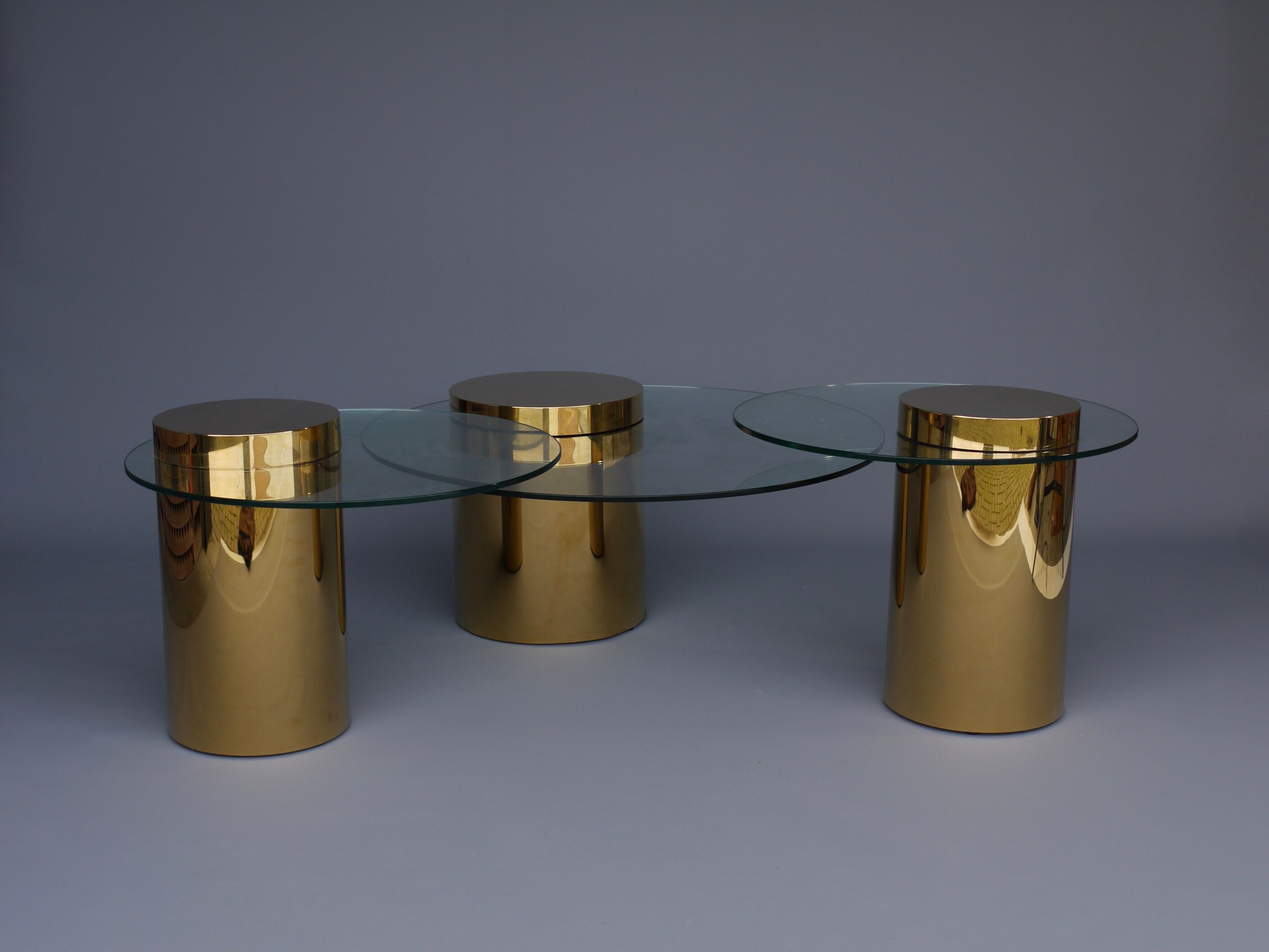 Polished Brass and Glass Low Tables. 2000s. Set of 3