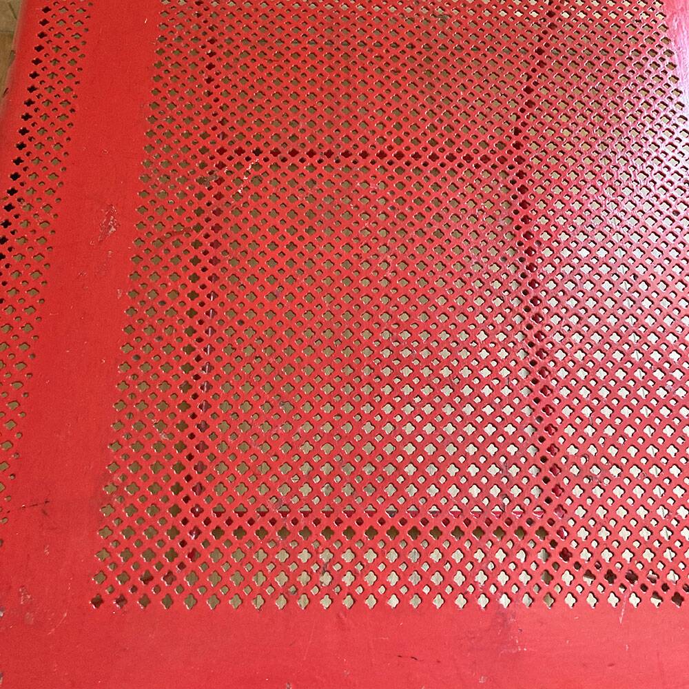 Perforated metal coffee table from the 1950s