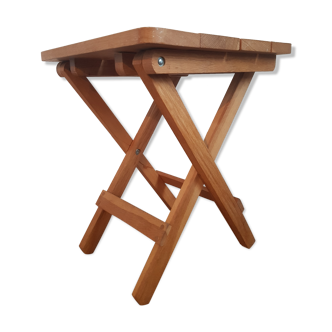 Folding stool made of solid wood