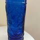cobalt blue molded glass bottle in relief decoration bunches of grapes