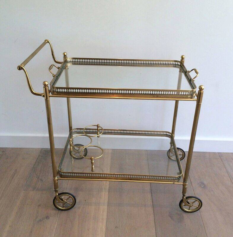 Neoclassical brass trolley with removable trays.