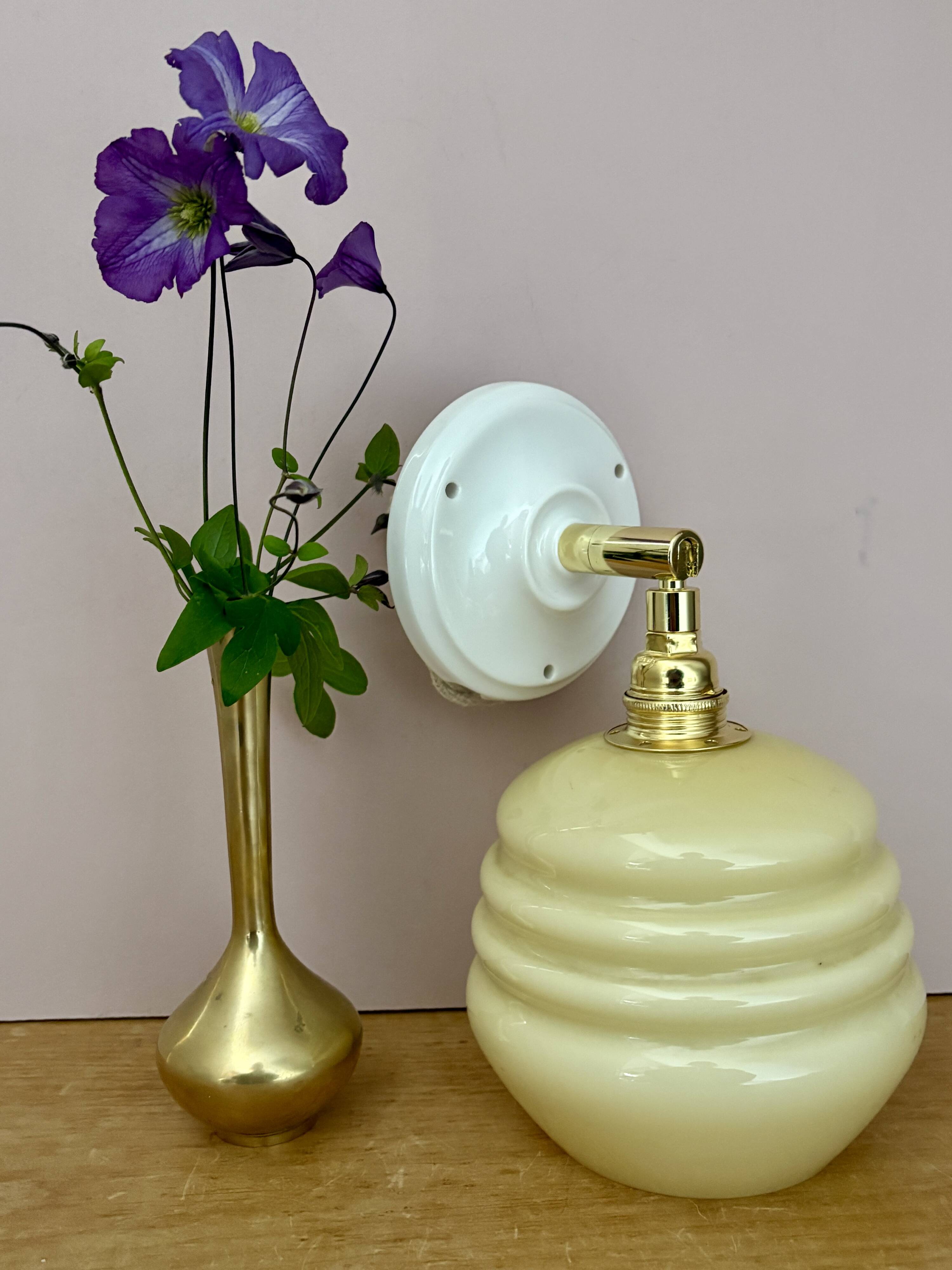 Vintage globe wall lamp in pale yellow opaline