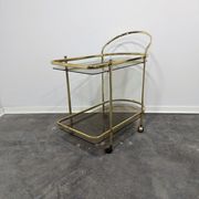 Desserte en laiton et verre fumé des années 1960