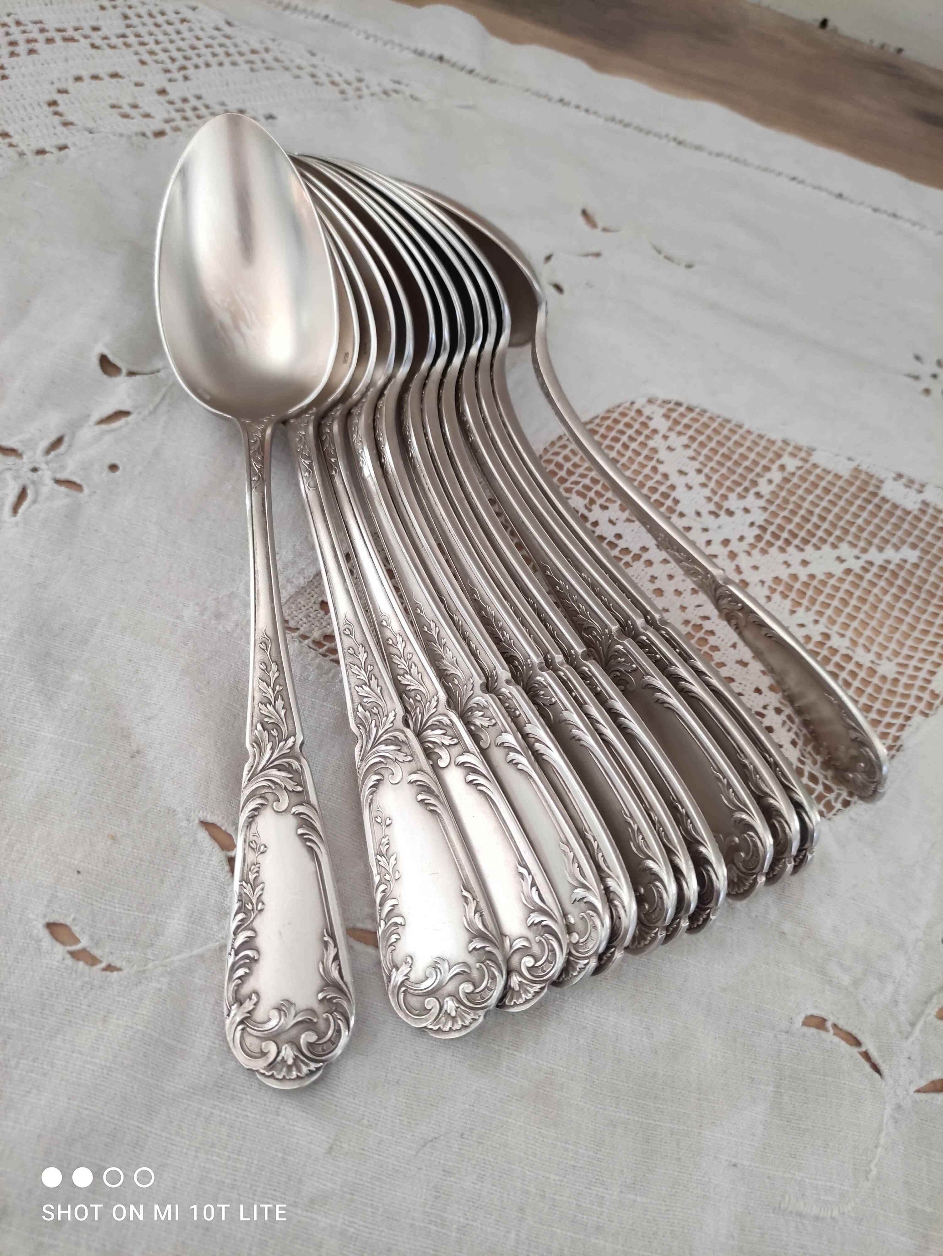 Set of 12 old silver-plated soup spoons