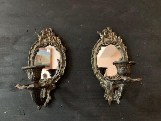 Pair of antique bronze candle holders