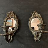 Pair of antique bronze candle holders