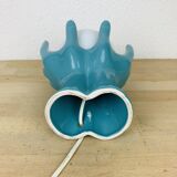 Blue ceramic hands lamp and glass globe