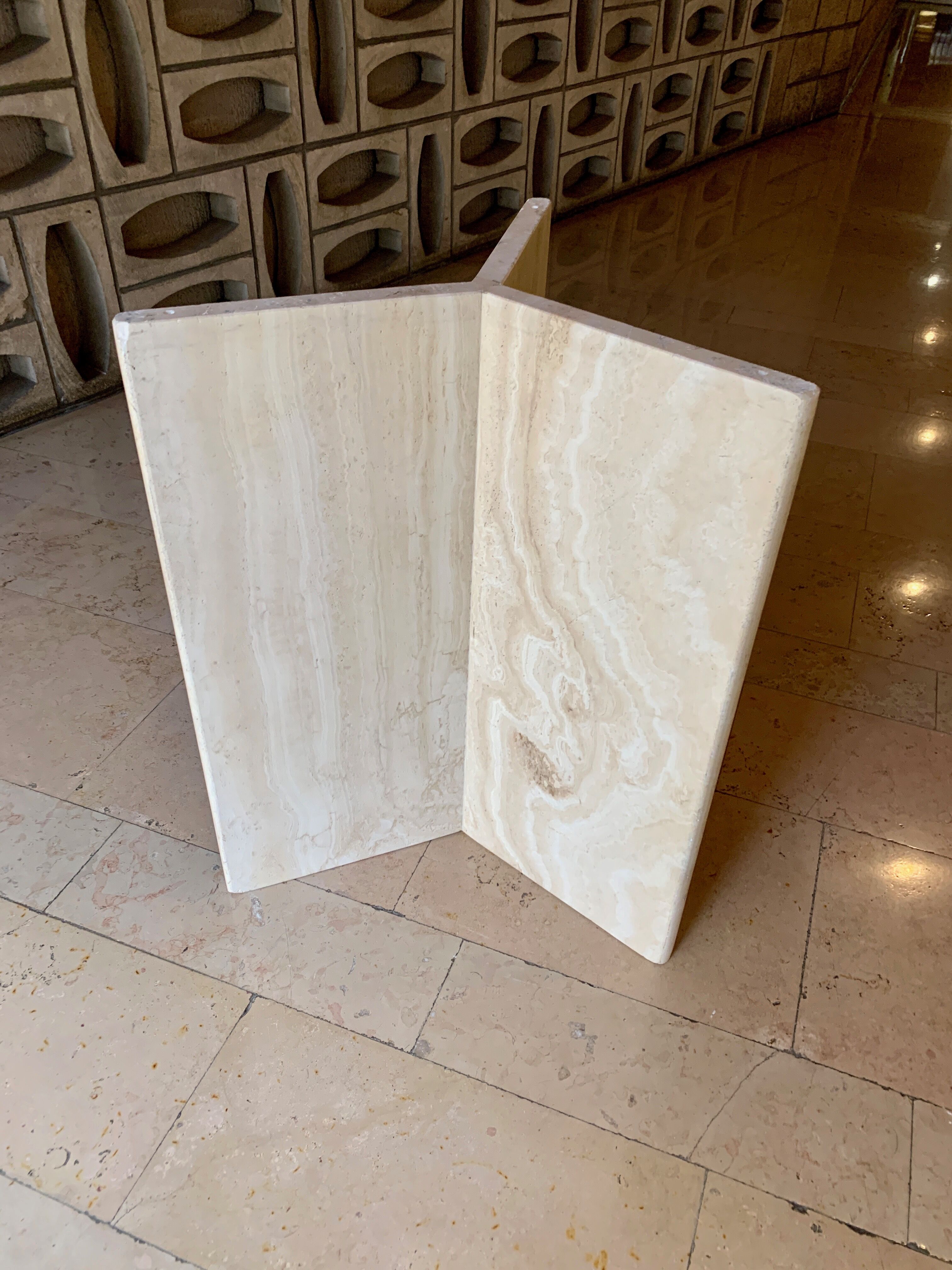 Round travertine dining table
