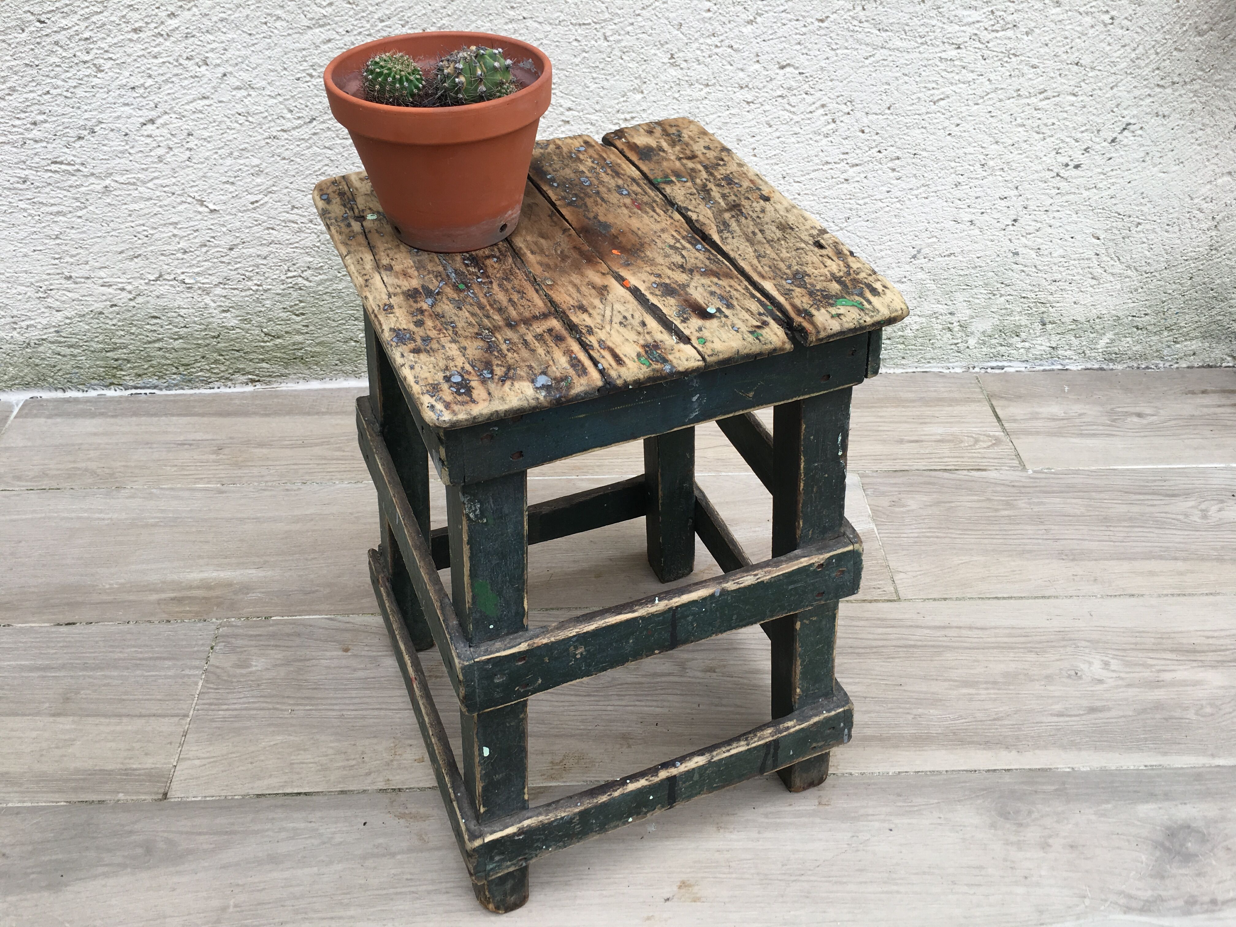 Former green workshop stool