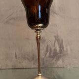 Tinted glass photophore on high metal foot with silver patina