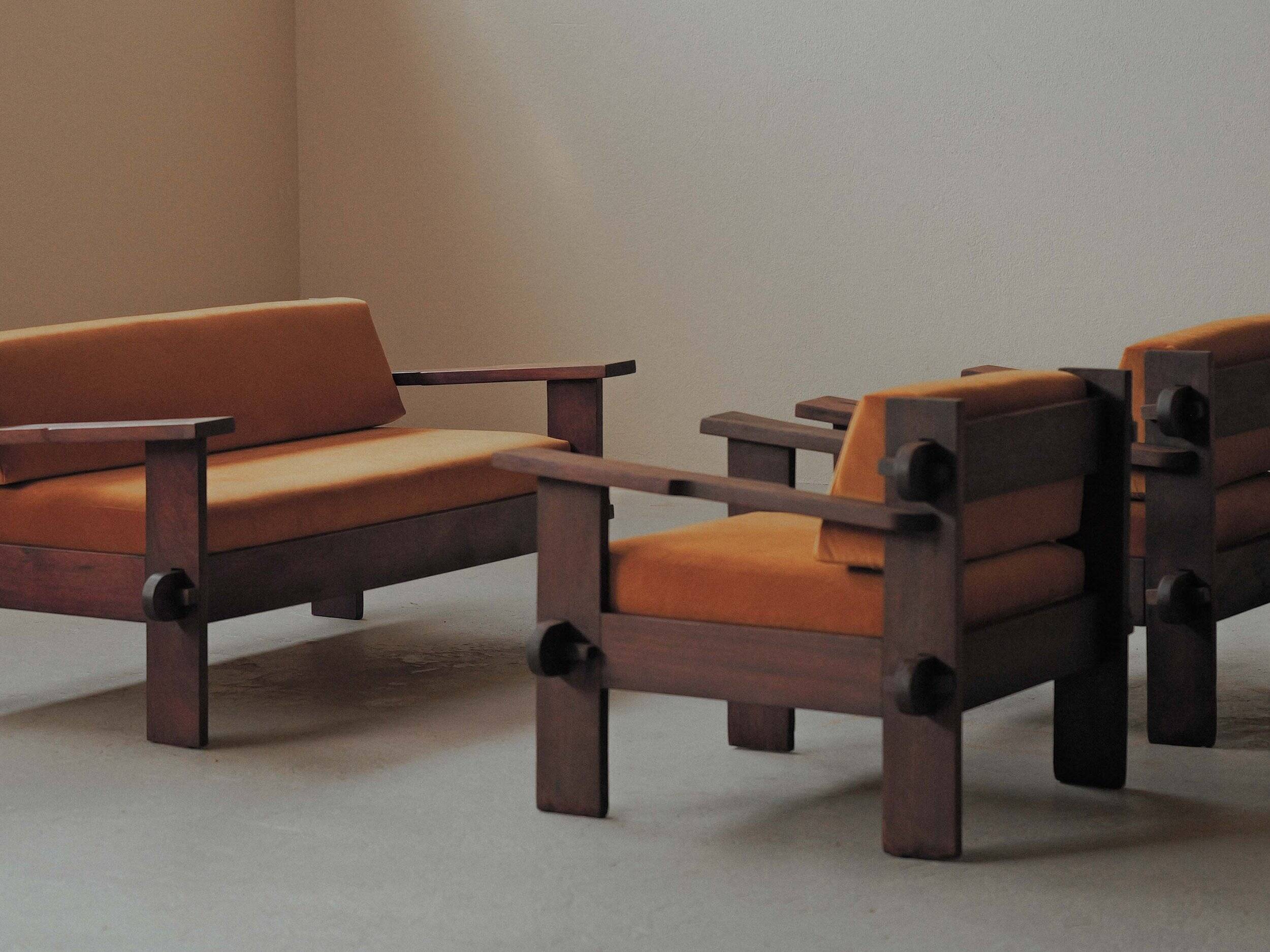 Pair of architect's armchairs in solid wood, France, circa 1970.