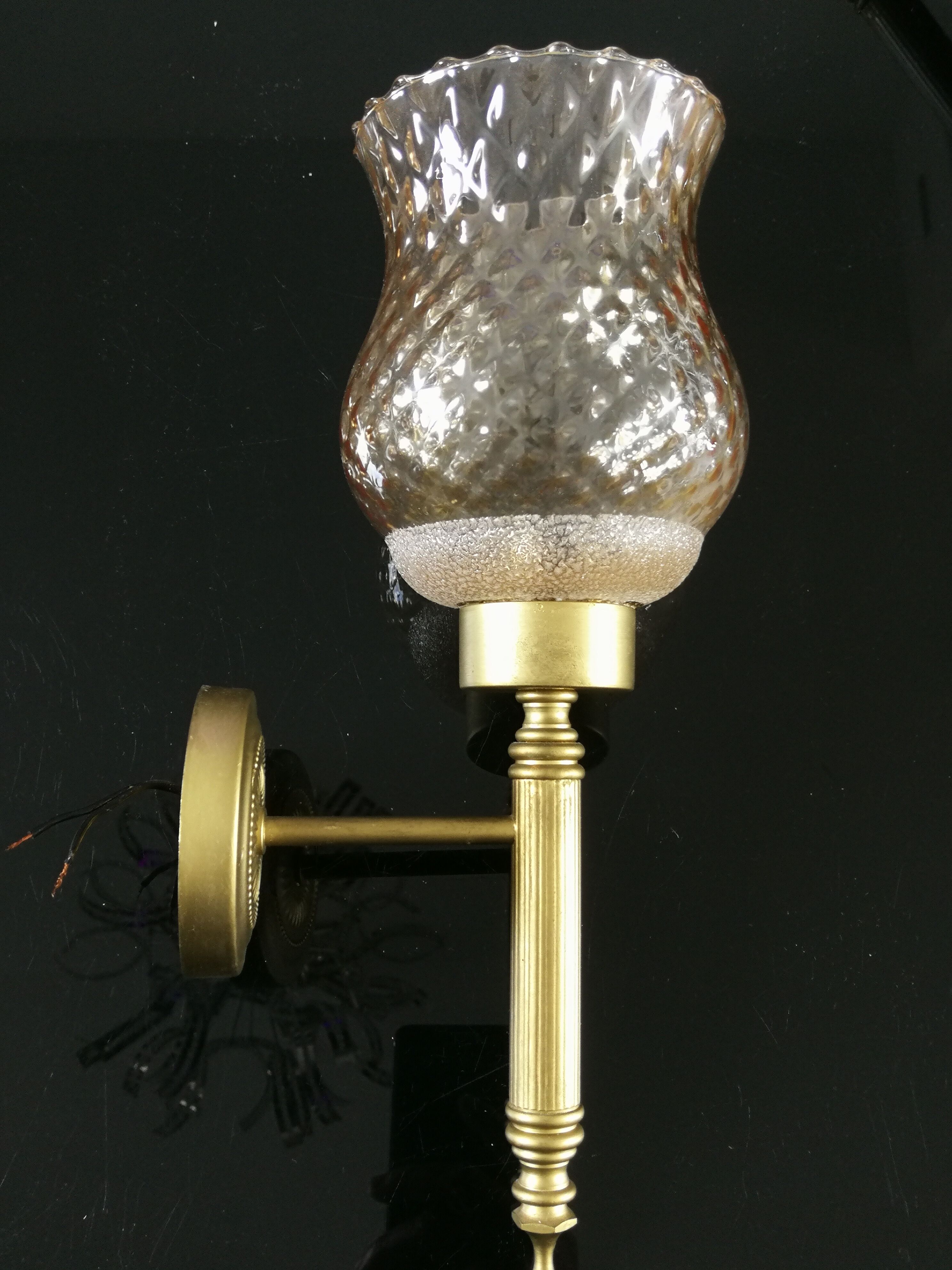 Glass and brass sconces
