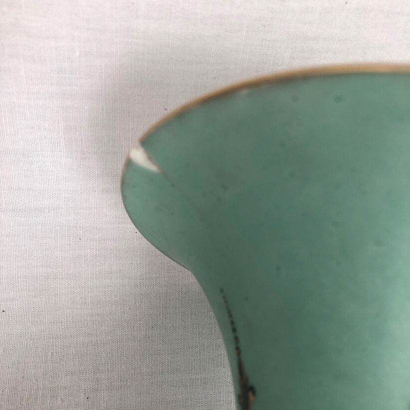 Ball vase with bent barrel in celadon green porcelain, nineteenth