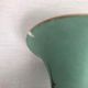 Ball vase with bent barrel in celadon green porcelain, nineteenth