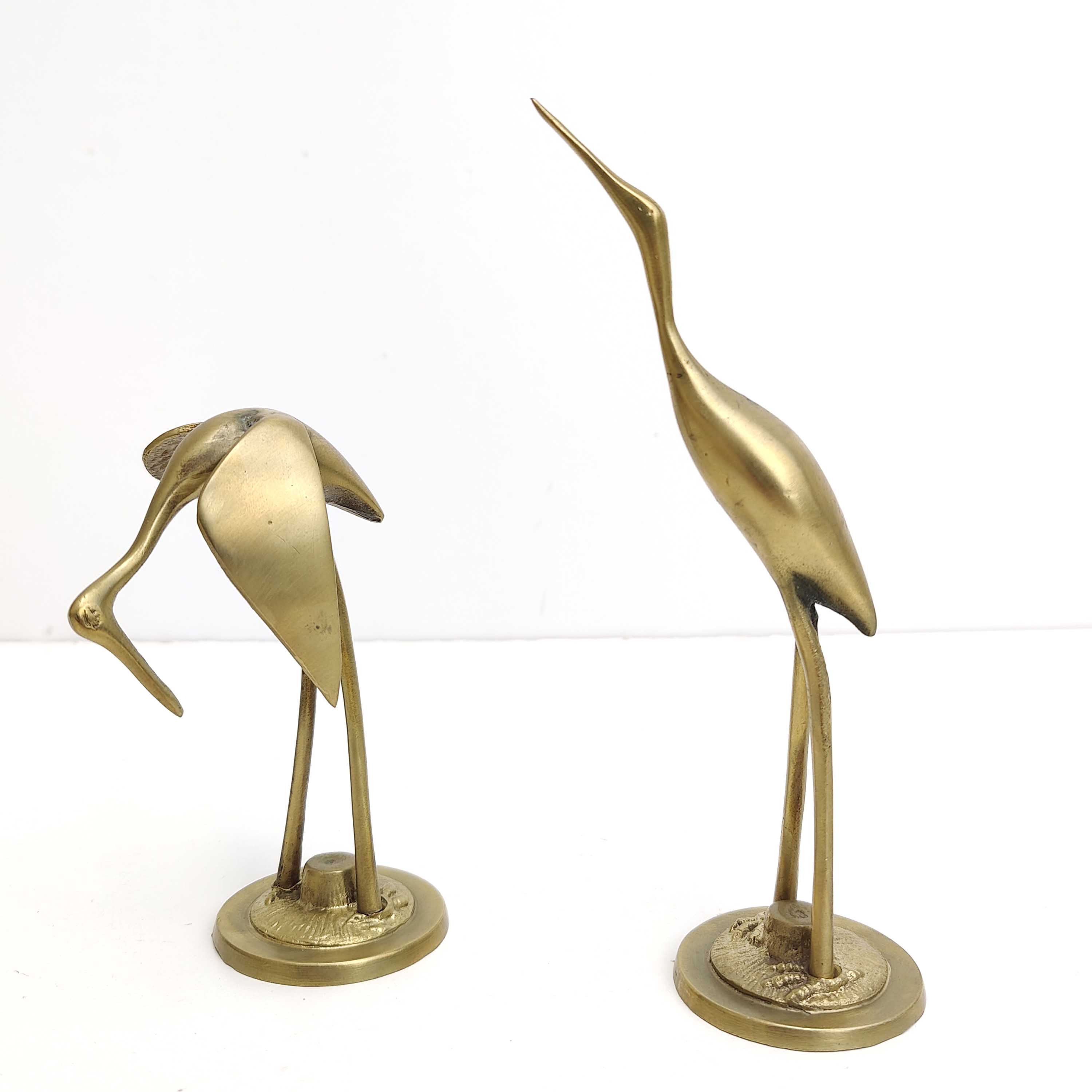 Pair brass herons