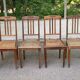 4 Art Deco chairs in solid oak with caning from the 1920s.