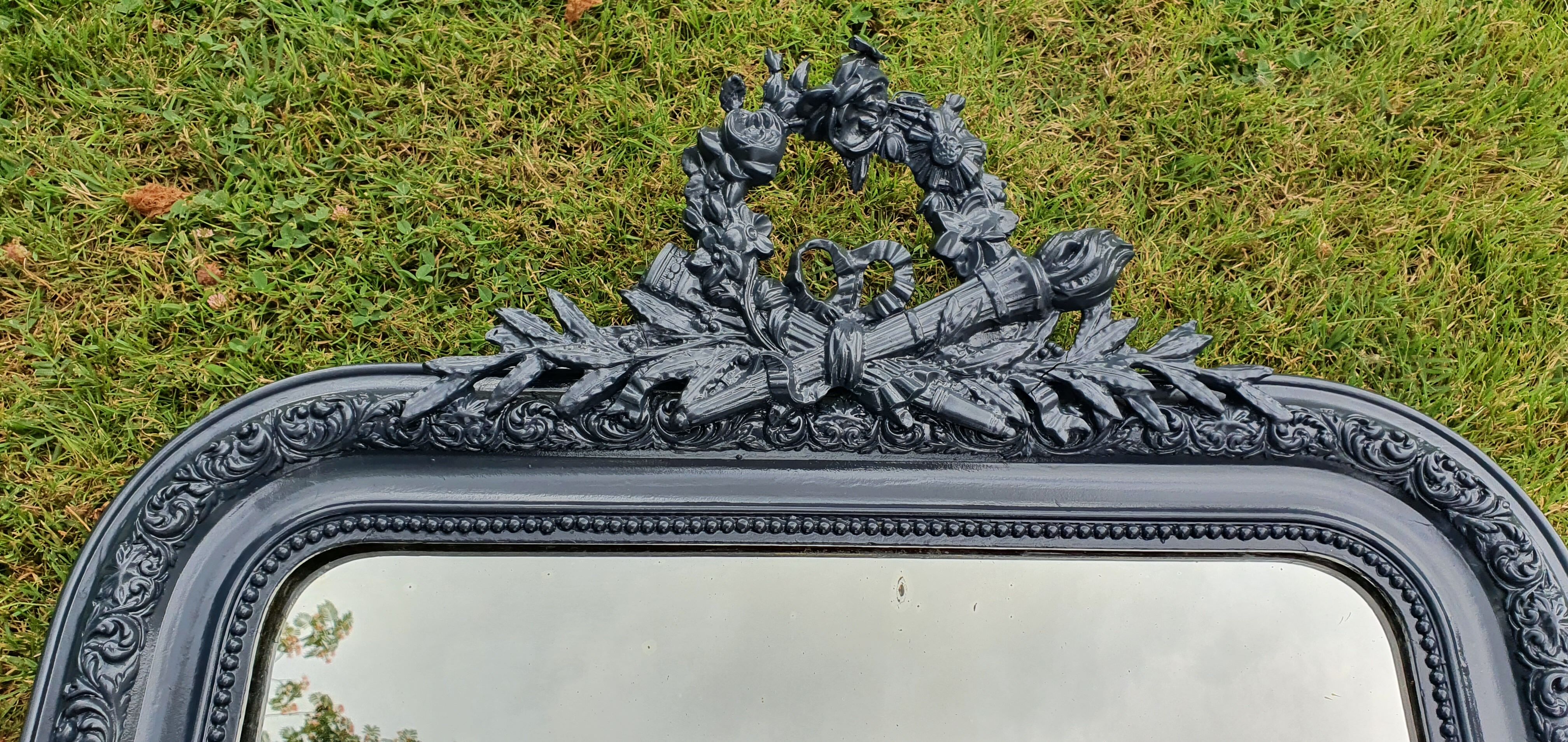 Old mirror Louis Philippe anthracite gray with pricked ice.