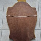 Carved and gilded wooden mirror, the pediment decorated with a shell.