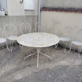 Wrought iron garden furniture from the early 20th century.