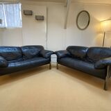 Pair of black leather sofas produced by Poltrona Frau, circa 1980/1990.