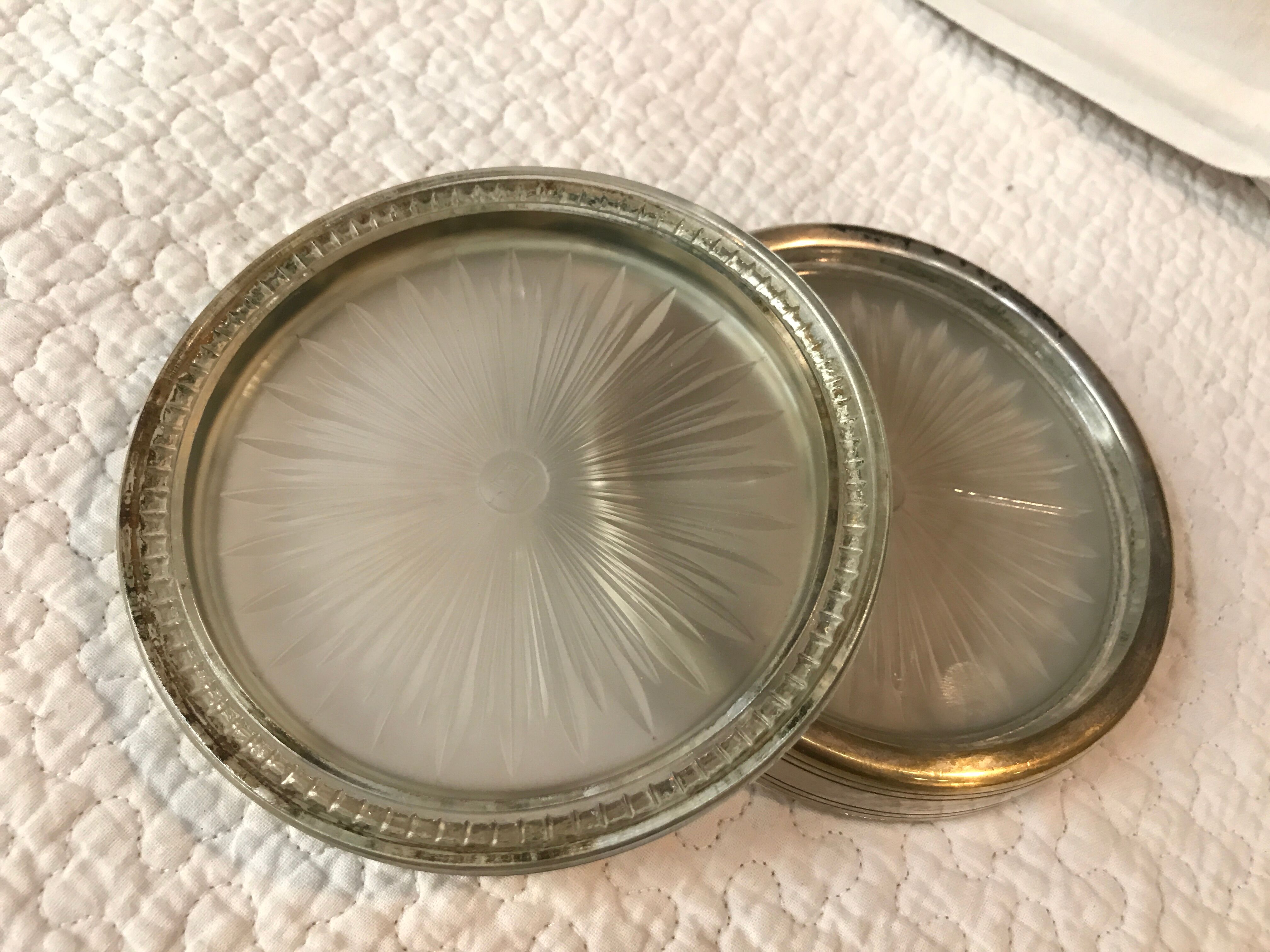 Pair of silver metal and glass bottle bottoms