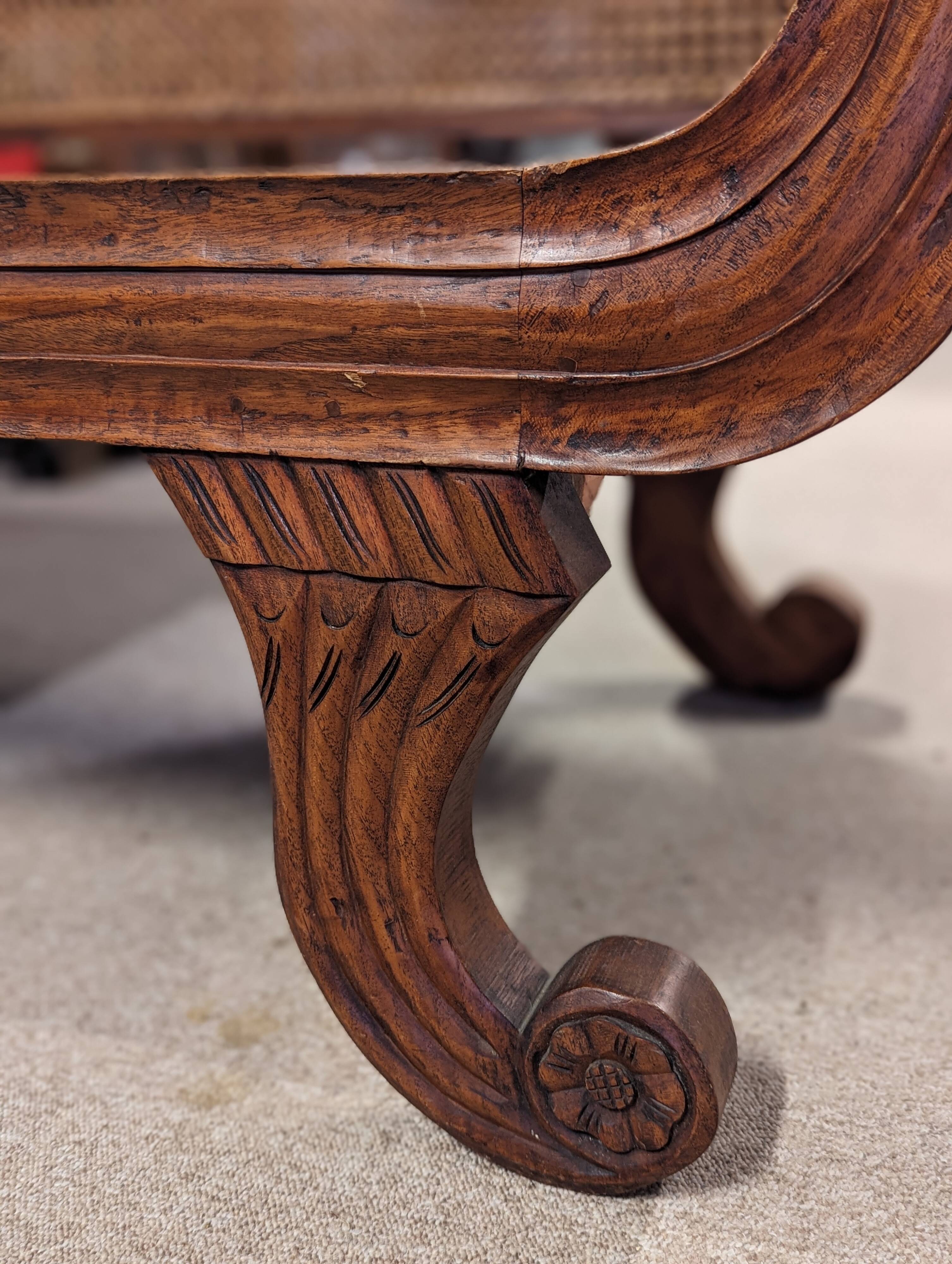 Large colonial caned bench