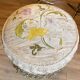 Pouf d'époque Napoléon III en tissu capitonné d'origine à roulettes