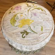 Napoleon III period ottoman in original upworked fabric with wheels