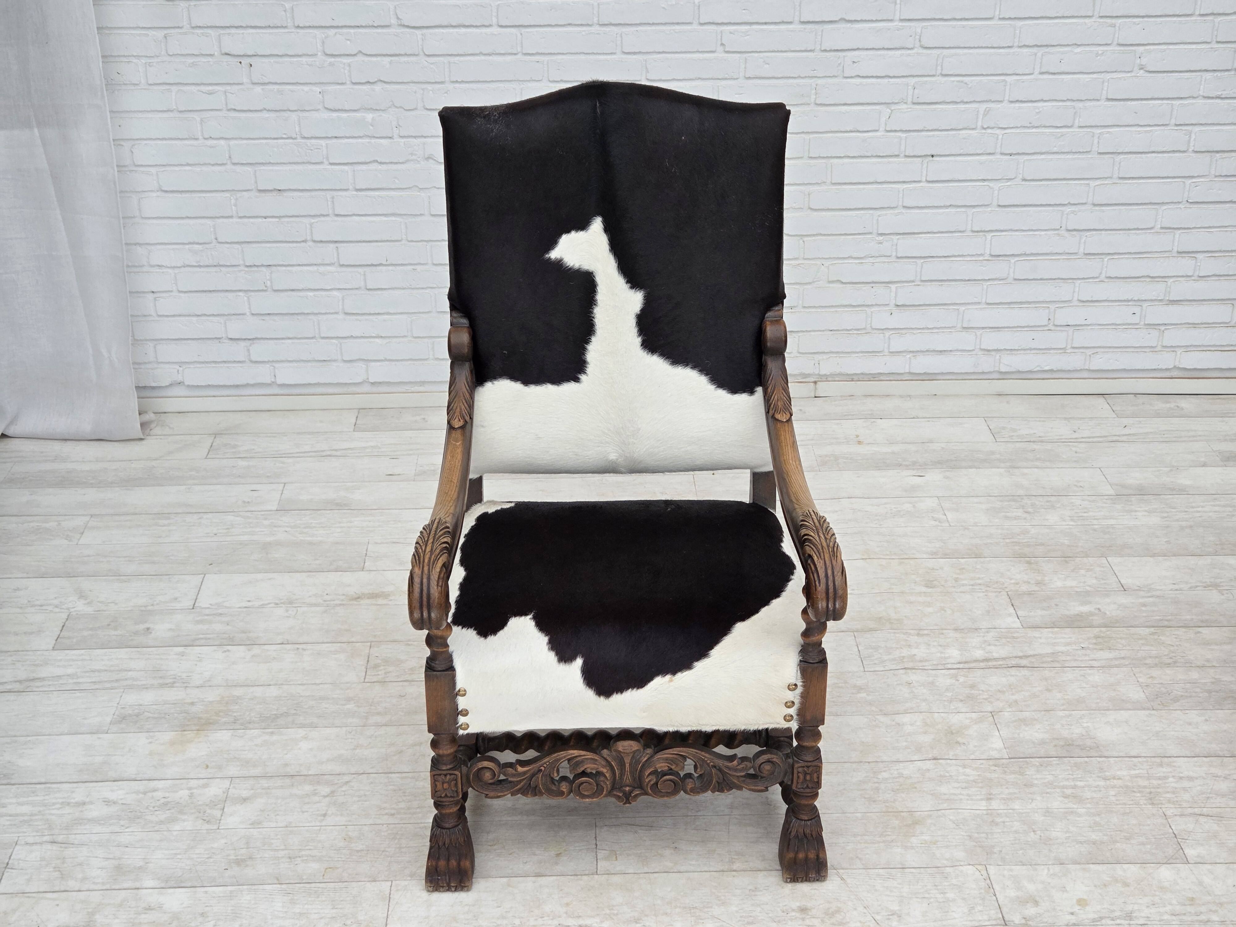 1950s, Danish highback armchair, genuine cowhide, oak wood.