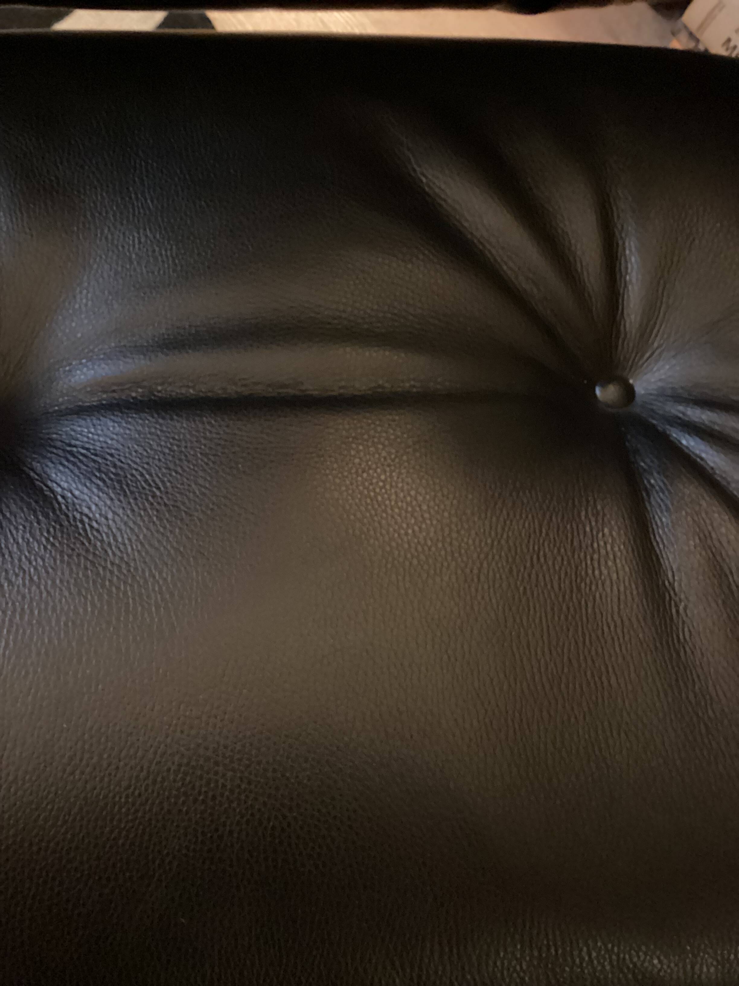 Chair and ottoman by Charles Eames, Herman Miller edition.