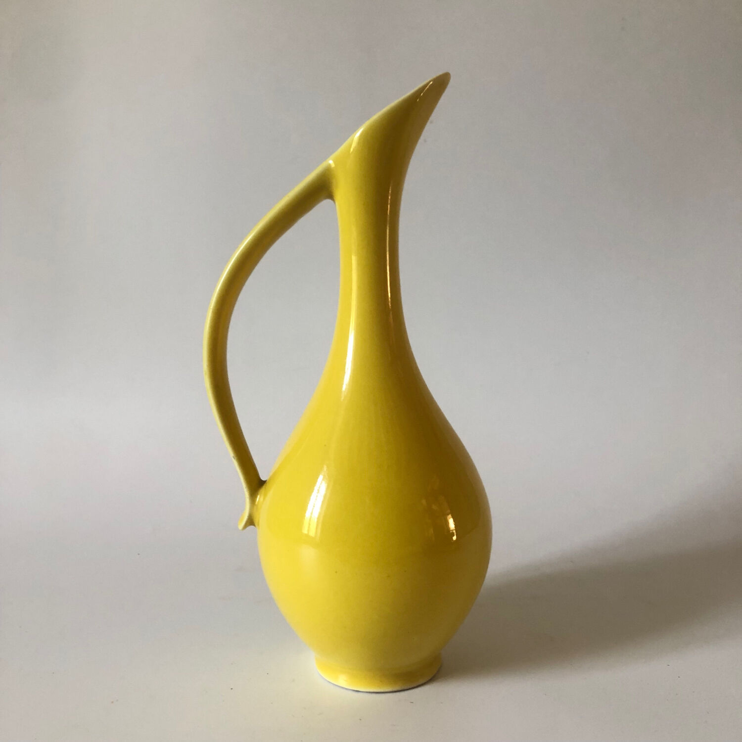 Vintage yellow ceramic decanter