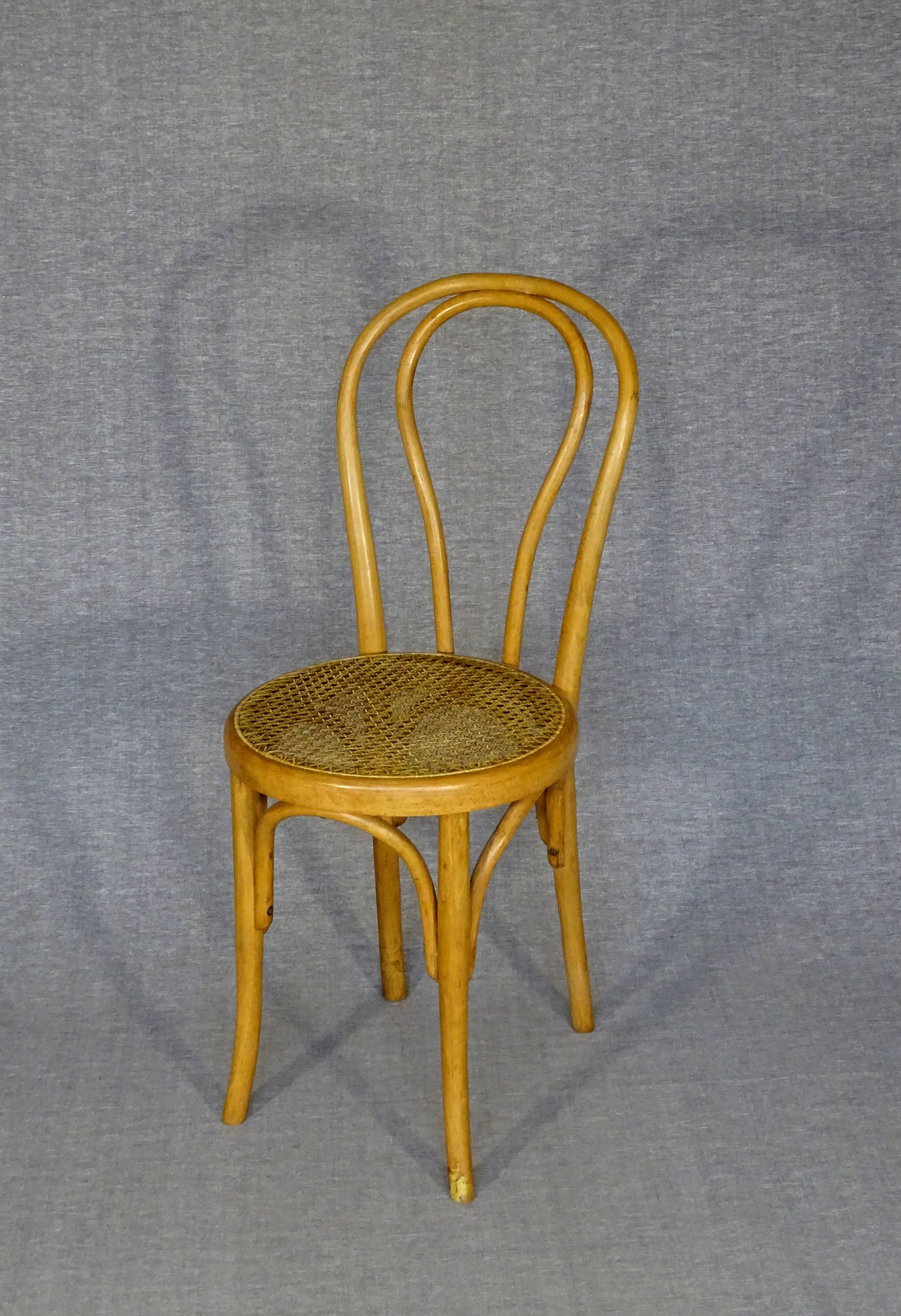 4 mismatched bistro chairs in wood and cane, Thonet, Horgen circa 1910