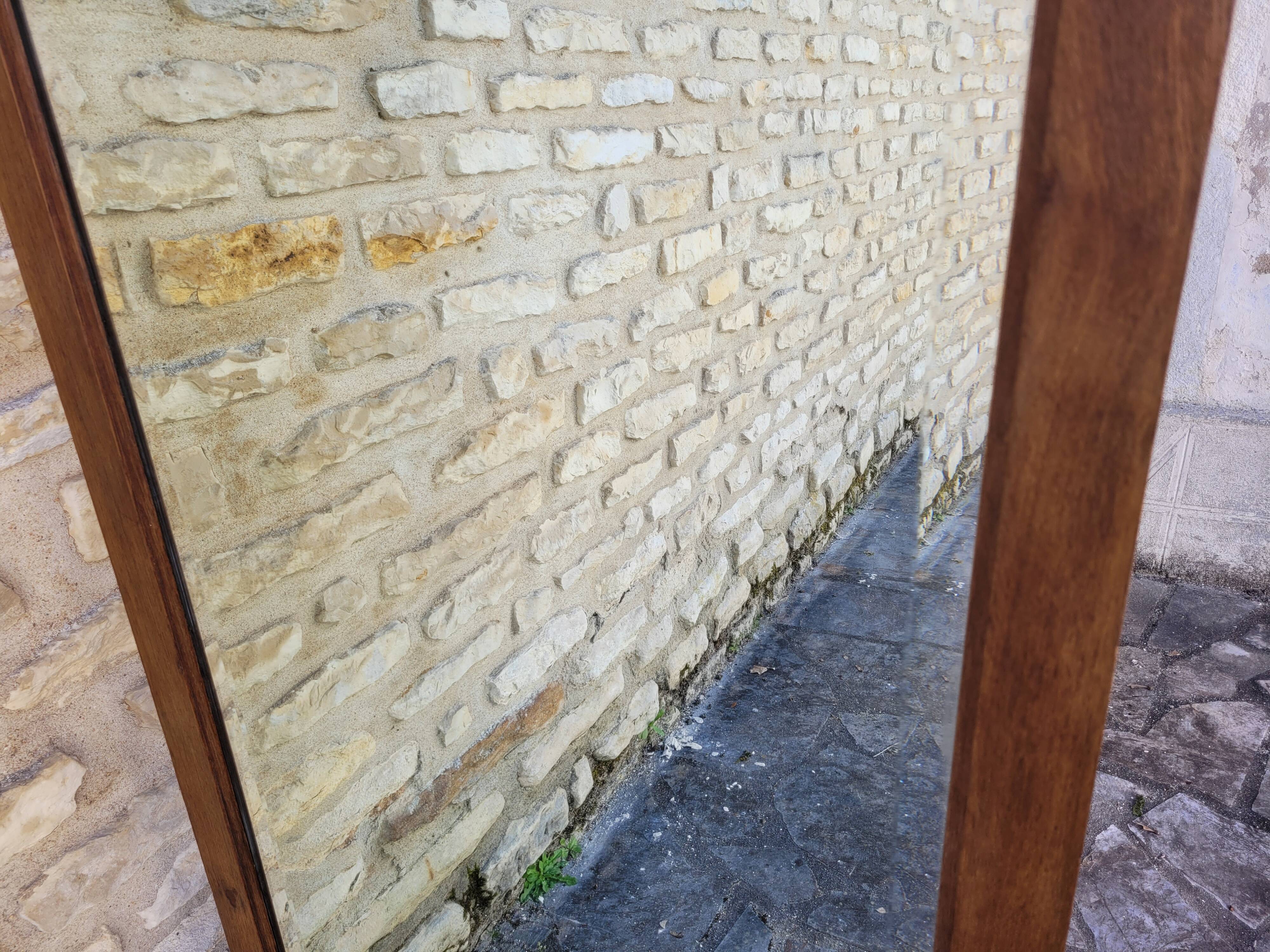 Art Deco oak mirror with bevelled glass from the 1930s.