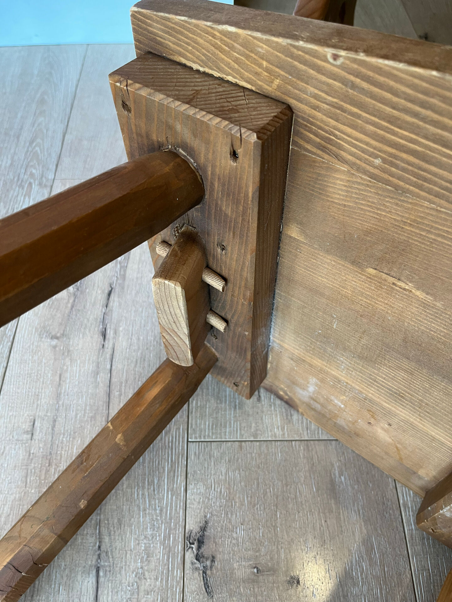 Pair of vintage wooden chairs in alpine chalet style.