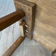 Pair of vintage wooden chairs in alpine chalet style.