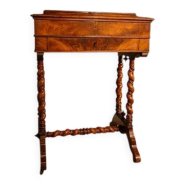 Antique wooden sewing table with drawer.